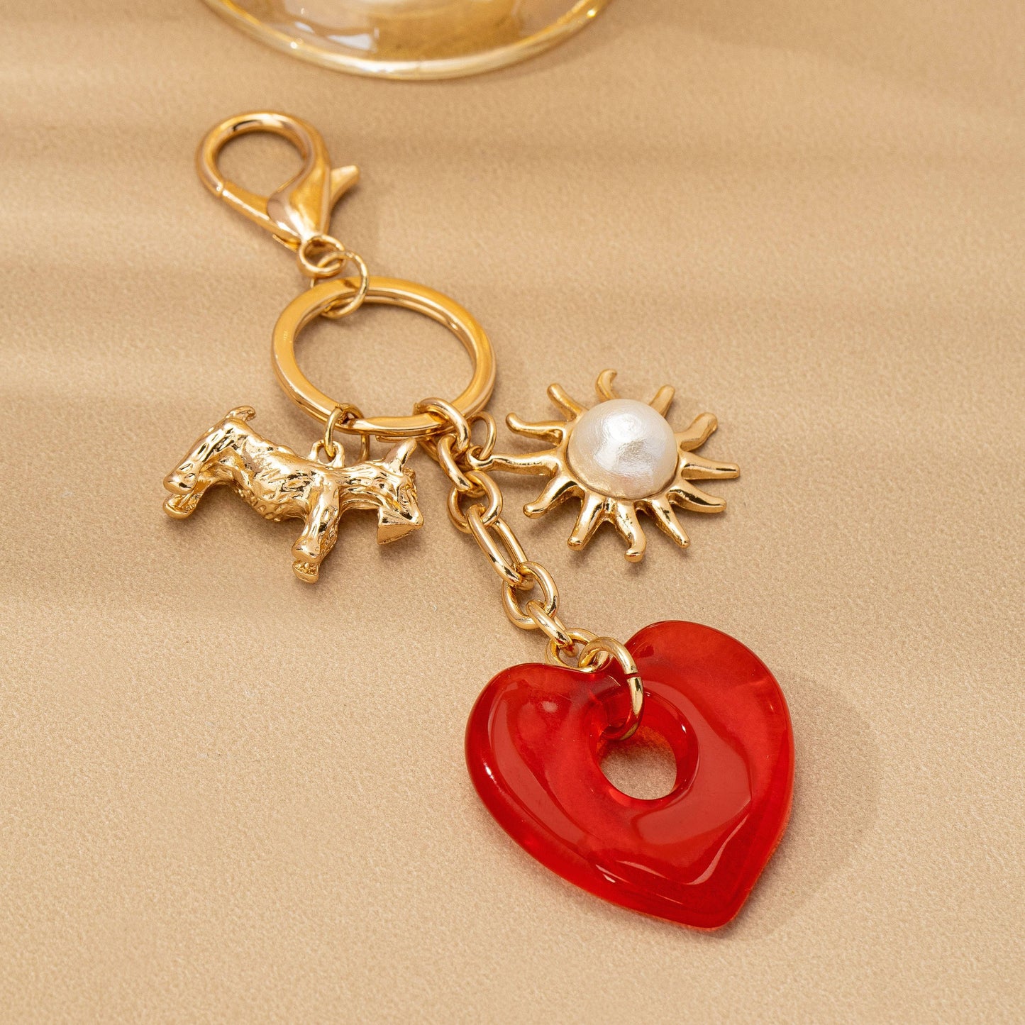 BAG CHARM KEY CHAIN-RESIN HEART DOG PEARL SUNBLAST