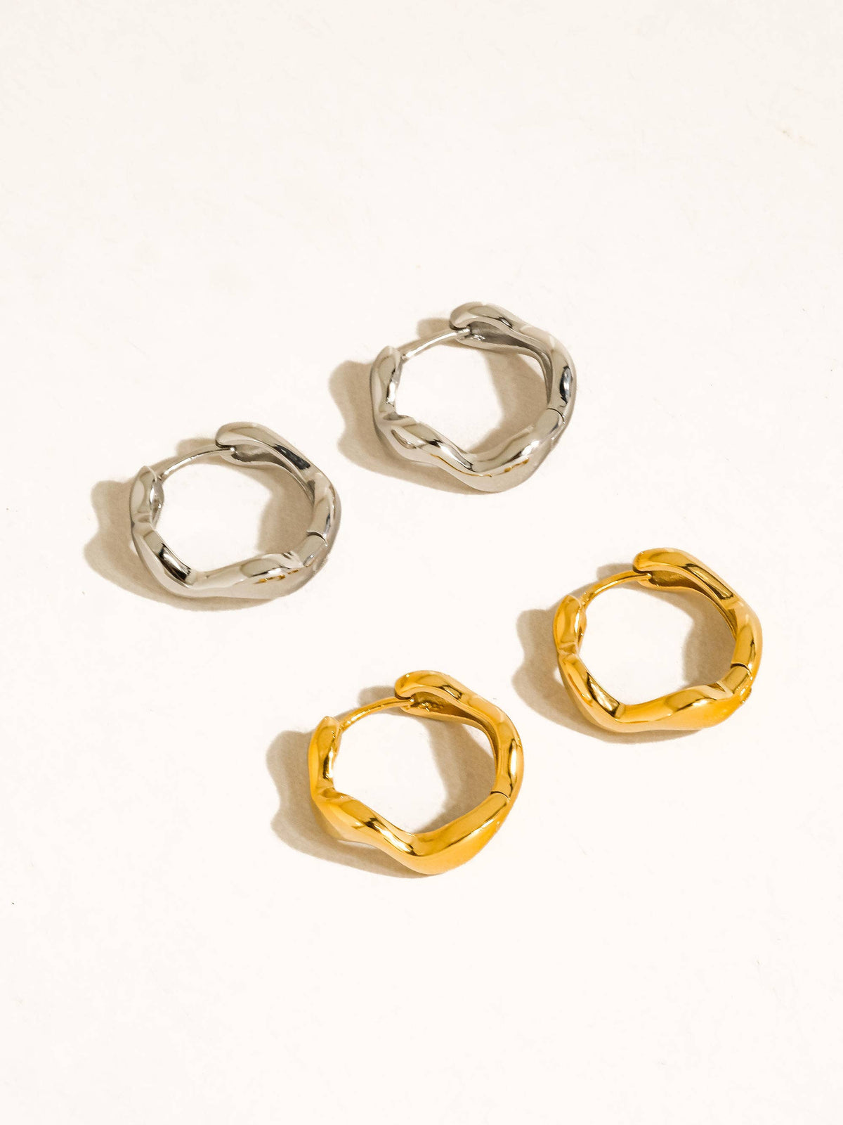 Bellac 18K Gold Non-Tarnish Wavy Hoop Earrings: Silver