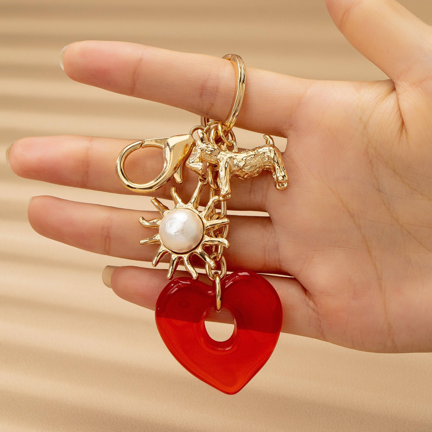BAG CHARM KEY CHAIN-RESIN HEART DOG PEARL SUNBLAST