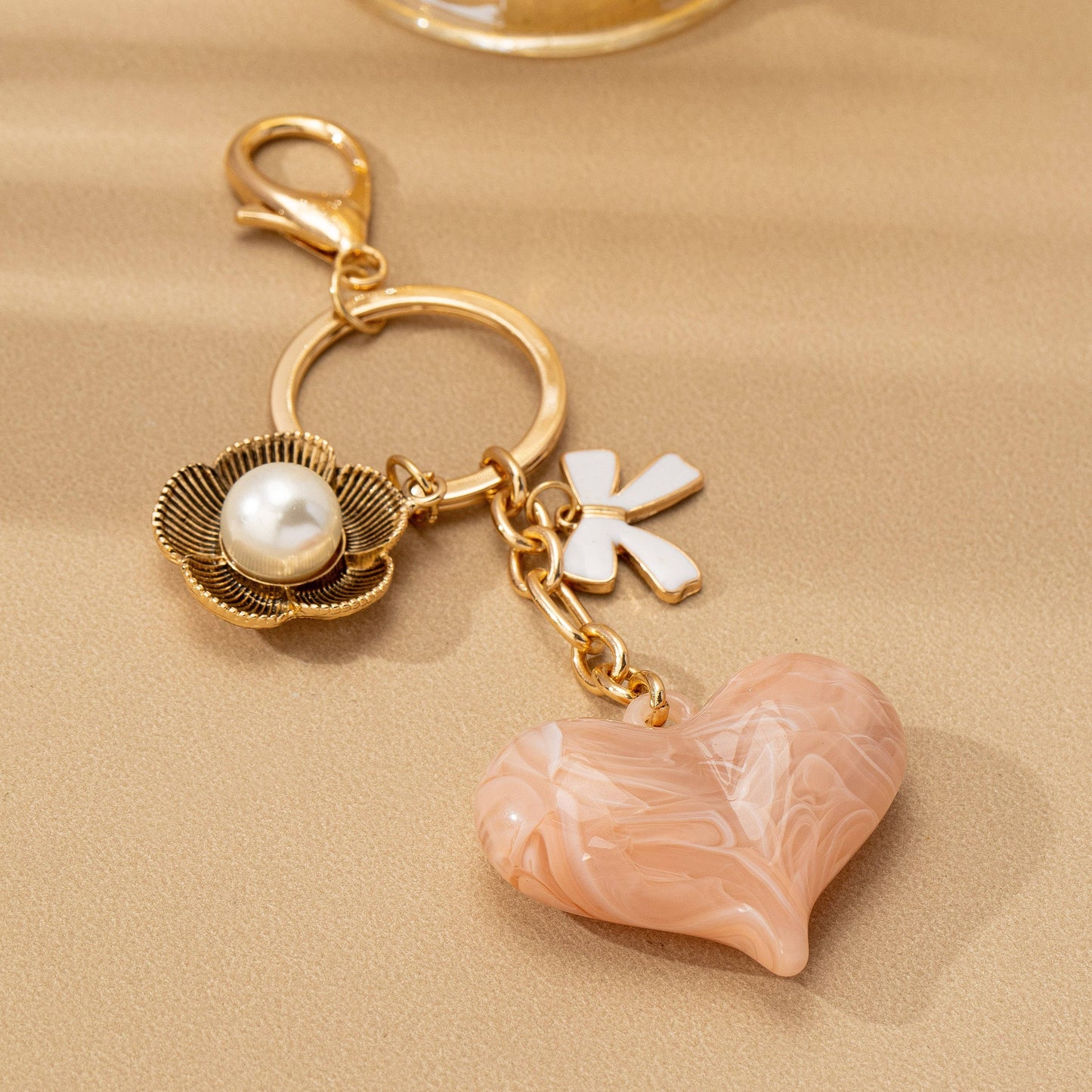 BAG CHARM KEY CHAIN-SWIRL HEART PERAL FLORAL BOW
