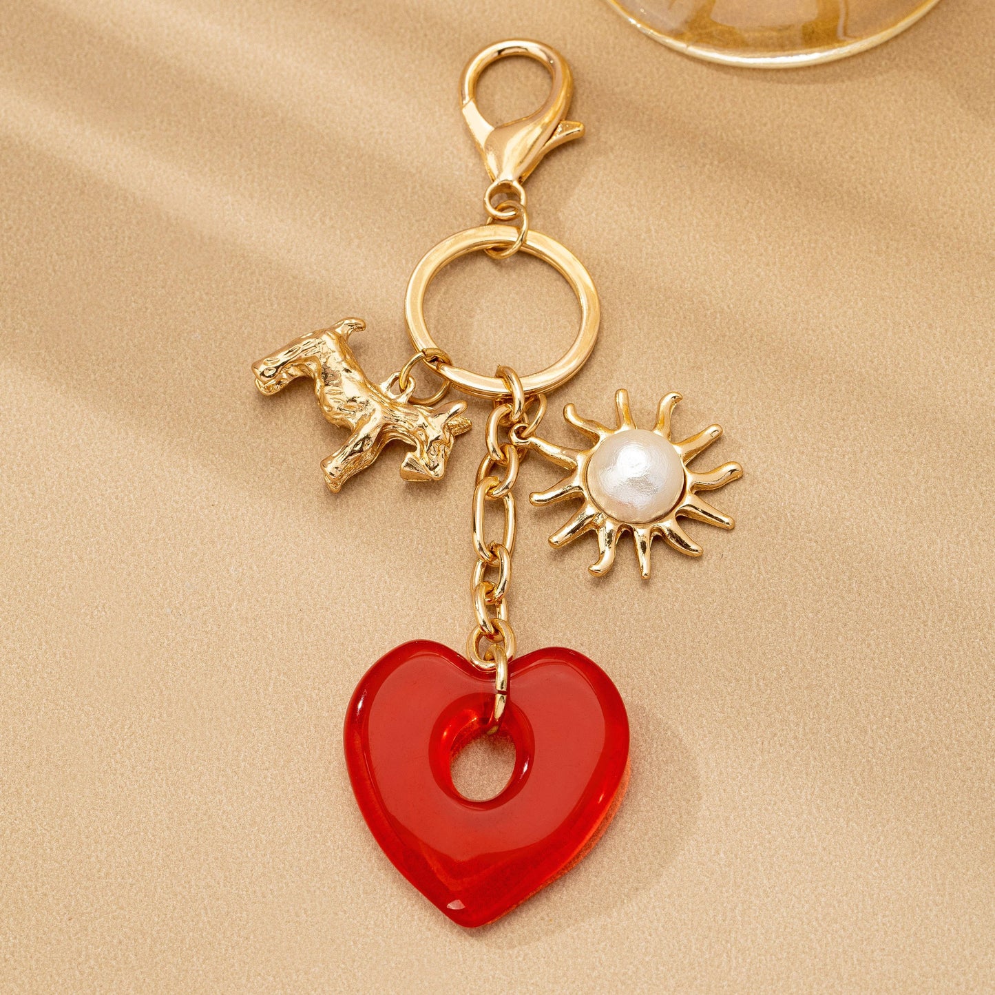 BAG CHARM KEY CHAIN-RESIN HEART DOG PEARL SUNBLAST