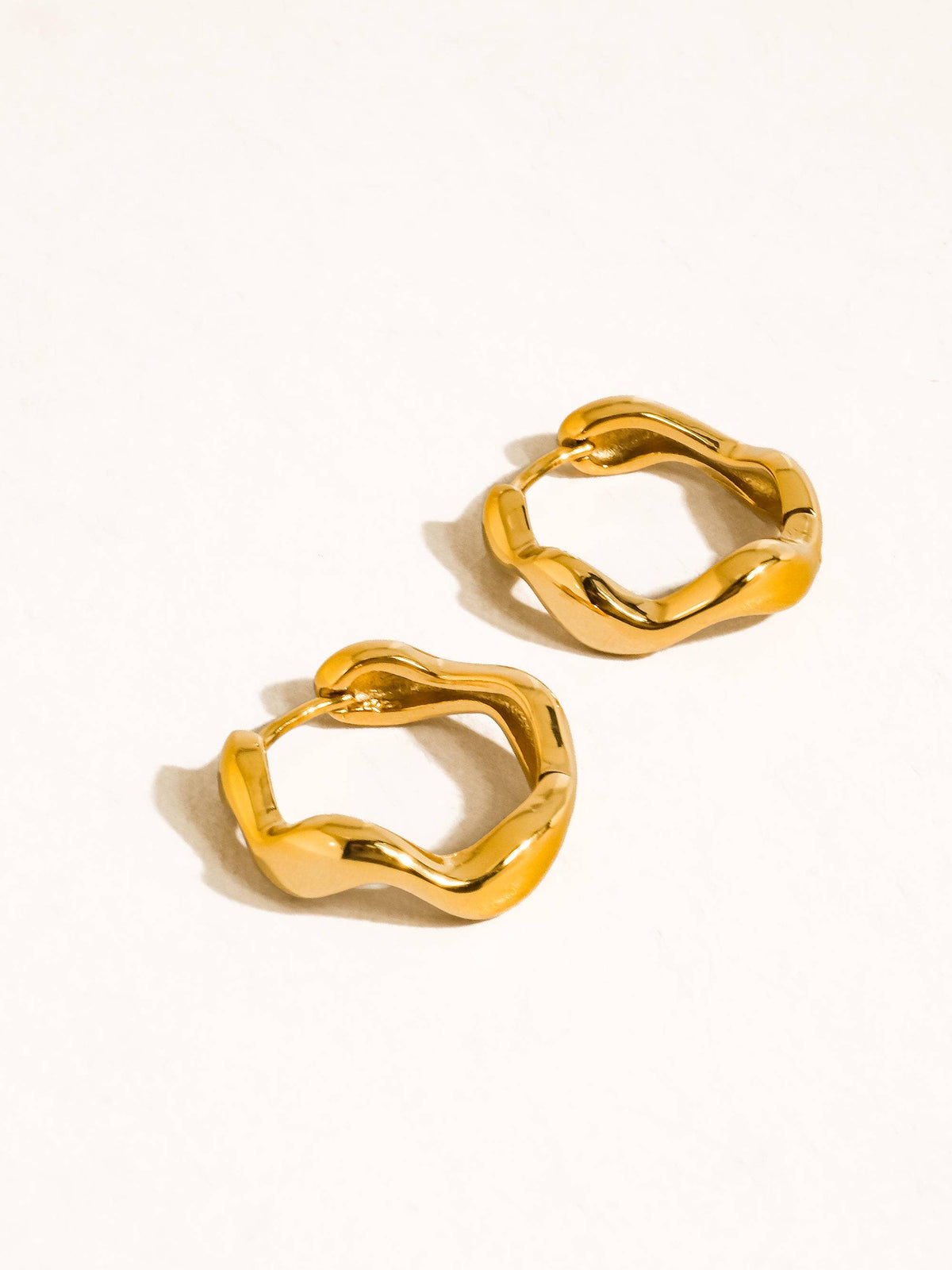 Bellac 18K Gold Non-Tarnish Wavy Hoop Earrings: Silver