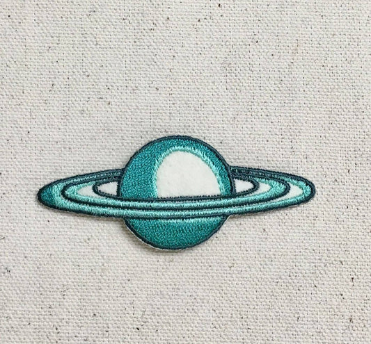 Saturn - Teal/Tan Rings - Space/Planet